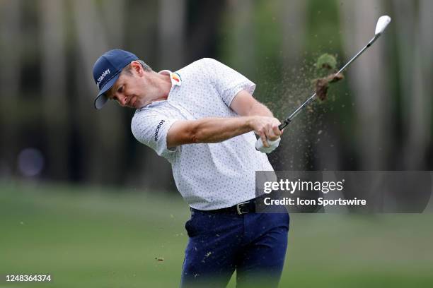 Justin Rose of England hits an approach shot at the 7th hole during the first round of THE PLAYERS Championship on THE PLAYERS Stadium Course at TPC...