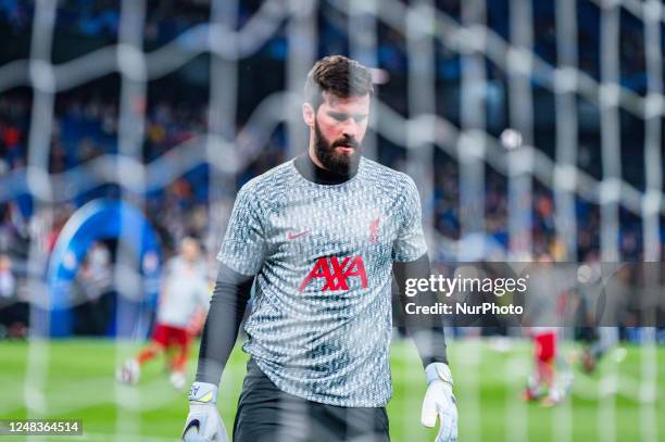 Allison during the warm up before the football match between Real Madrid and Liverpool valid for the second leg of the round of 16 of the Uefa...