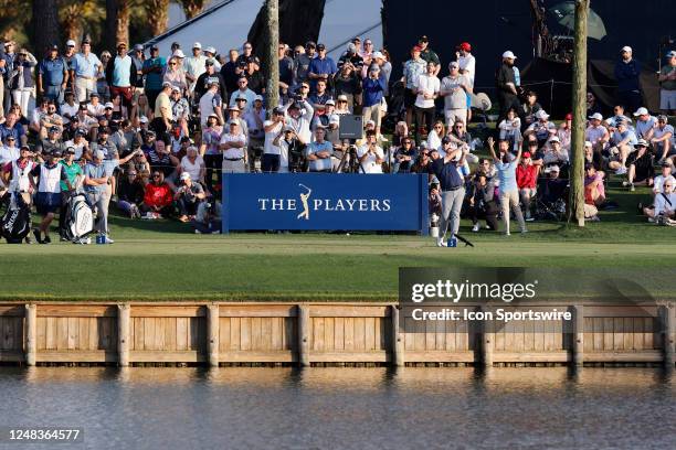 General view as Shane Lowry of Ireland hits his tee shot at the 17th hole during the first round of THE PLAYERS Championship on THE PLAYERS Stadium...