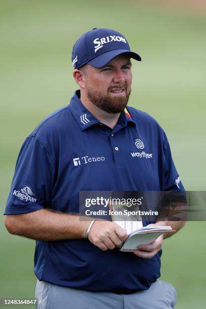 Shane Lowry of Ireland looks on while standing in the fairway at the 16th hole during the first round of THE PLAYERS Championship on THE PLAYERS...