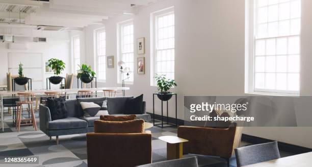a bright and open modern workspace - office background stock pictures, royalty-free photos & images