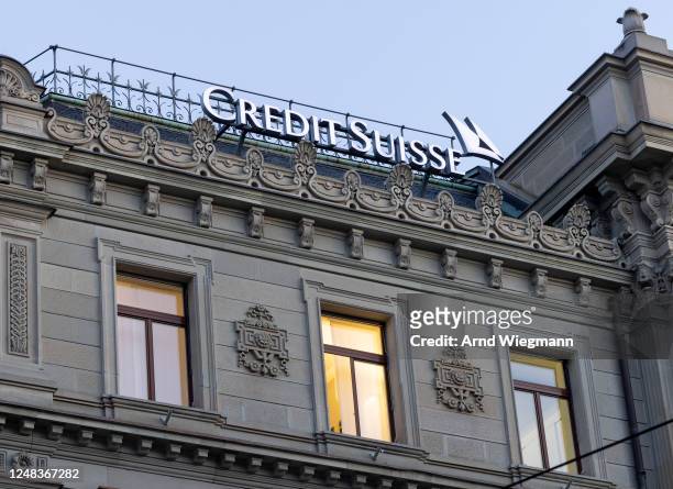 The company logo is seen at the global headquarters of Swiss bank Credit Suisse the day after its shares dropped approximately 30% on March 16, 2023...