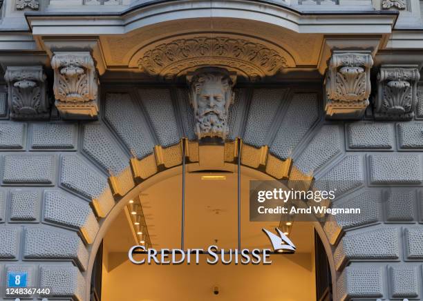 The company logo is seen at the global headquarters of Swiss bank Credit Suisse the day after its shares dropped approximately 30% on March 16, 2023...