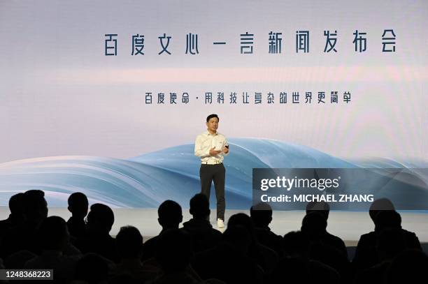 Baidu co-founder and CEO Robin Li speaks at the unveiling of Baidus AI chatbot Ernie Bot at an event in Beijing on March 16, 2023. - Chinese search...