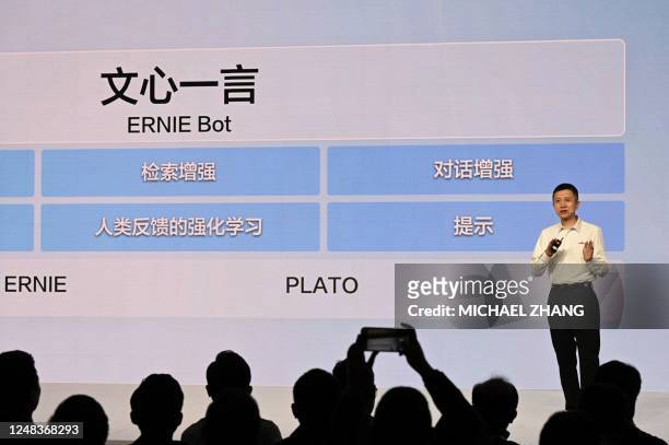 Baidu CTO Wang Haifeng speaks at the unveiling of Baidus AI chatbot Ernie Bot at an event in Beijing on March 16, 2023. - Chinese search engine...