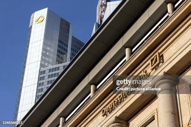 March 2023, Hesse, Frankfurt/Main: View of the Commerzbank Tower and a Deutsche Bank branch in Frankfurt's banking district. The Swiss central bank's...