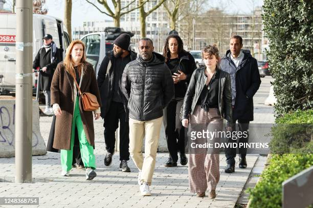 Sanda's father Ousmane Dia and friends of Sanda arrive for a session of the case before the Antwerp appeal court, a remark of the judge during the...