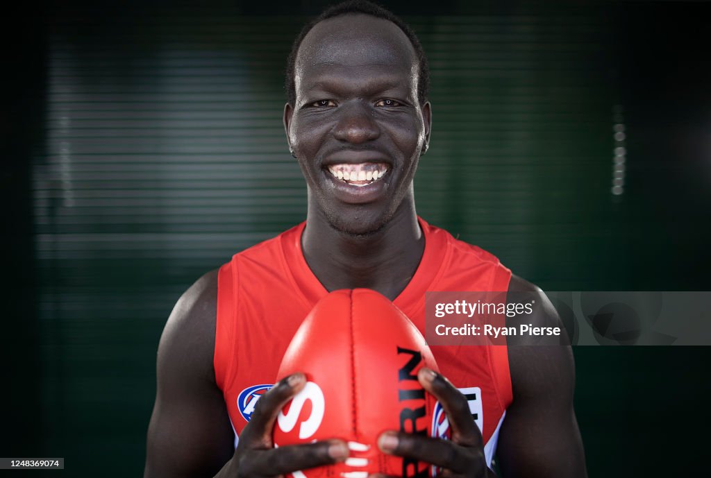 Ali Riar Sydney Swans AFL player Aliir Aliir poses during a portrait session ...