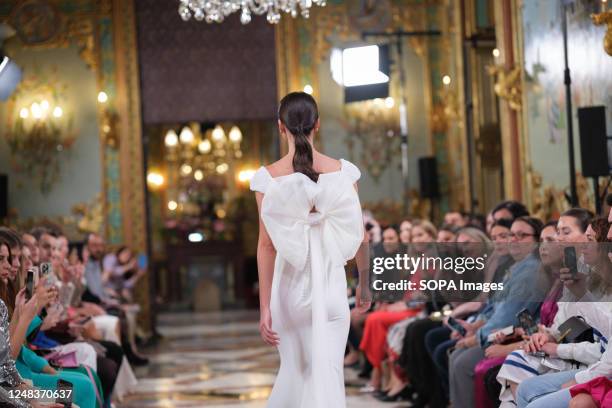 Model showcases creations by Silvia Fernandez during the Atelier Couture bridal catwalk within Madrid Fashion Week, at Santa Isabel Palace in Madrid.