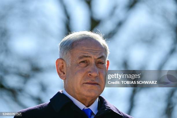 Israeli Prime Minister Benjamin Netanyahu arrives to visit the Platform 17 Memorial at Grunewald train station in Berlin on March 16, 2023. - The...