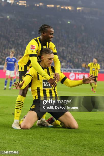 Nico Schlotterbeck of Borussia Dortmund celebrates after his scoring his team's first goal during the Bundesliga match between FC Schalke 04 and...