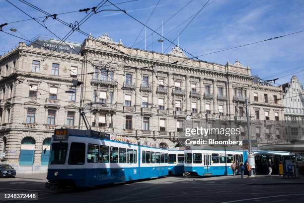 Tram passes the Credit Suisse Group AG headquarters in Zurich, Switzerland, on Thursday, March 16, 2023. Credit Suisse tapped the Swiss National Bank...