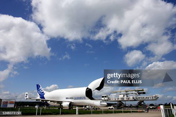 Wing and tail fin sections of the Airbus A380 are loaded onto an Airbus Beluga aircraft at the Airbus manufacturing site at Broughton, in North...