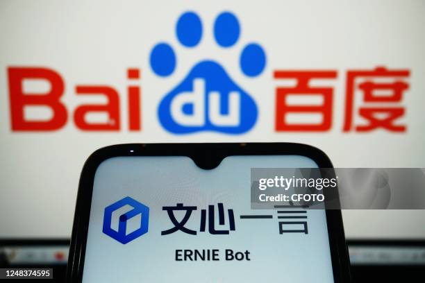 Photo taken on March 16, 2023 shows ERNIE Bot and the logo of Baidu. Baidu's "ERNIE Bot," known as China's version of ChatGPT, was officially...