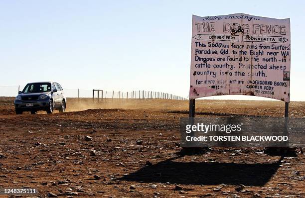 The Dingo Fence divides the desolate, stony, outback landscape known as Moon Plain on the edge of the Simpson Desert, 05 July 2005. The 5,600...