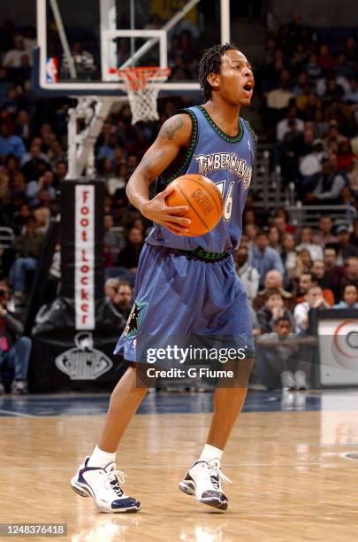 Troy Hudson of the Minnesota Timberwolves handles the ball against the Washington Wizards on January 25, 2003 at the MCI Center in Washington, DC....