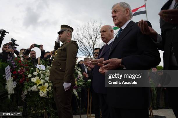 President of Iraq, Abdul Latif Rashid visits the Halabja cemetery and Halabja Monument and Peace Museum on the 35th anniversary of Halabja chemical...