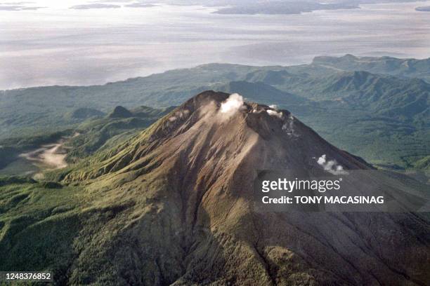 The clear summit of Mount Bulusan volcano in Sorsogon province shows little smoke and huge deposits of ash and volcanic materials in this aerial...