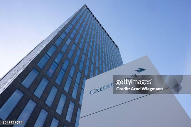 The logo of Swiss bank Credit Suisse is seen the day after its shares dropped approximately 30%, on March 16, 2023 in front of its Oerlikon office...