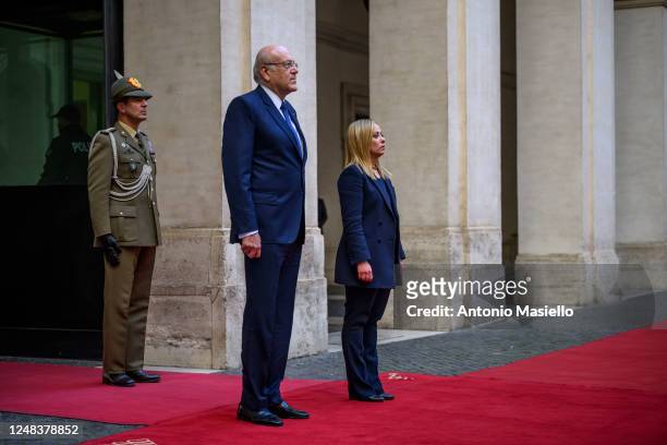 Italian Prime Minister Giorgia Meloni welcomes Lebanese Prime Minister Najib Mikati before their meeting at Palazzo Chigi, during his official visit...