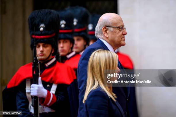 Italian Prime Minister Giorgia Meloni welcomes Lebanese Prime Minister Najib Mikati before their meeting at Palazzo Chigi, during his official visit...