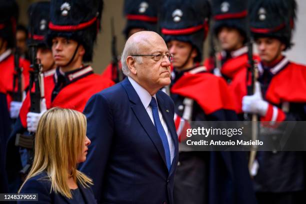 Italian Prime Minister Giorgia Meloni welcomes Lebanese Prime Minister Najib Mikati before their meeting at Palazzo Chigi, during his official visit...