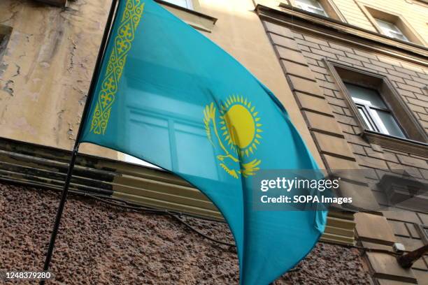 The national flag of the Republic of Kazakhstan on the building of the Consulate of the Republic of Kazakhstan in Saint Petersburg, Russian...