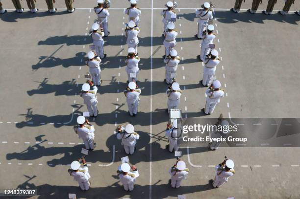 March 15 Srinagar Kashmir, India: New recruits of the Indian Border Security Force take oath during a passing out parade in Humhama on the outskirts...