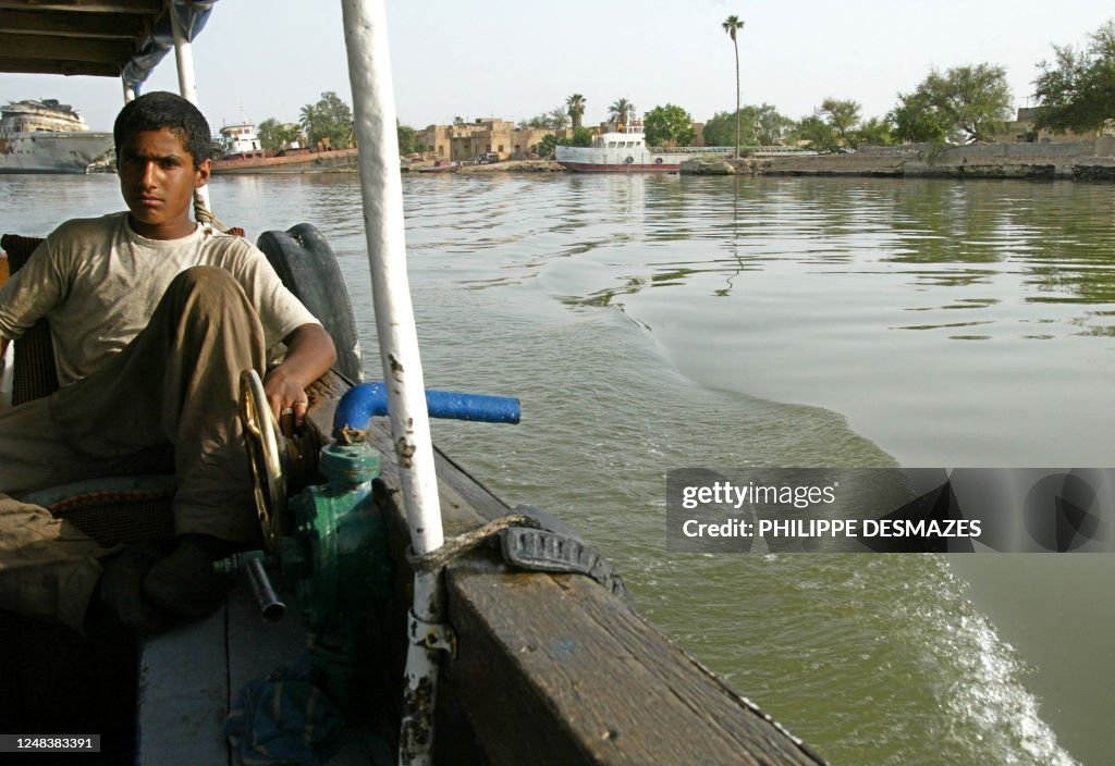 Basra Raja Driver Ali the driver of a leisure ferry sits in his boat in Shatt al-Arab ...