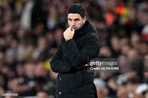 Arsenal's Spanish manager Mikel Arteta reacts during the UEFA Europa League round of 16, second-leg football match between Arsenal and Sporting...