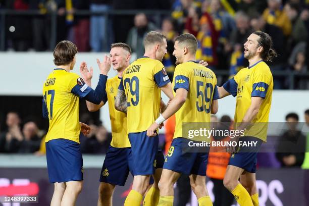 Union's players celebrate after winning a soccer game between Belgian Royale Union Saint-Gilloise and German Union Berlin, Thursday 16 March 2023 in...