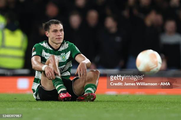 Manuel Ugarte of Sporting CP reacts after receiving a red card in extra time during the UEFA Europa League round of 16 leg two match between Arsenal...