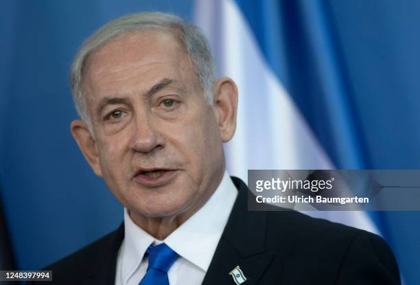 German Chancellor Olaf Scholz and Israeli Prime Minister Benjamin Netanyahu speak to the media following talks at the Chancellery on March 16, 2023...