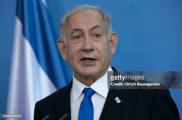 German Chancellor Olaf Scholz and Israeli Prime Minister Benjamin Netanyahu speak to the media following talks at the Chancellery on March 16, 2023...