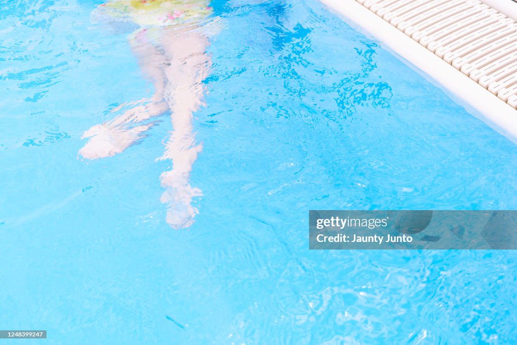 Girl in the pool