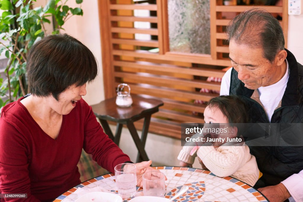 Grad Father Grand Father Grand Mother And Baby Boy High-Res Stock Photo - Getty Images