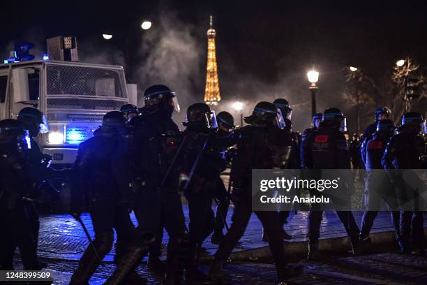 March 16: Riot police advance as clashes take place during a demonstration against French government's plan to raise the legal retirement age in...