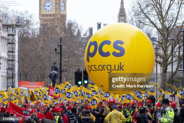 Members of the Public and Commercial Services Union from the civil service and public sector attend a Budget Day strike march on 15 March 2023 in...