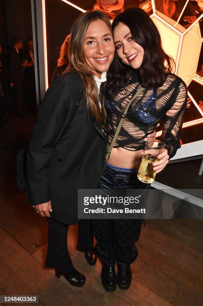Melanie Blatt and Eliza Lovechild attend the Hennessy X.O x Kim Jones collaboration global launch event on March 16, 2023 in London, England.