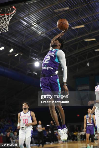 March 16: Kobi Simmons of the Greensboro Swarm dunks against the Mexico City Capitanes on March 16, 2023 at The Novant Health Fieldhouse in...