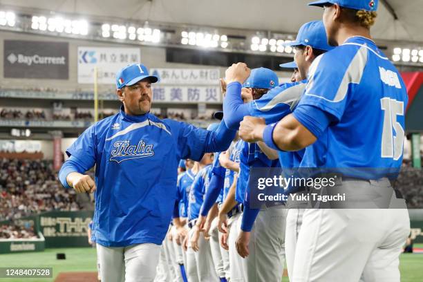 Manager Mike Piazza of Team Italy greets players on the field prior to the 2023 World Baseball Classic Quarterfinal game between Team Italy and Team...