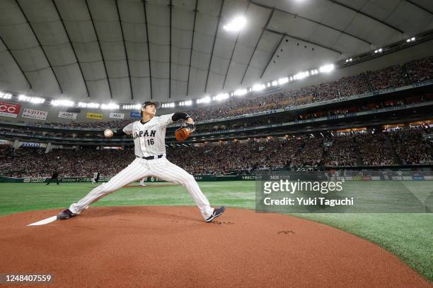 Shohei Ohtani of Team Japan pitches prior to the 2023 World Baseball Classic Quarterfinal game between Team Italy and Team Japan at Tokyo Dome on...