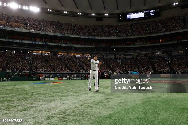 Shohei Ohtani of Team Japan takes the field prior to the 2023 World Baseball Classic Quarterfinal game between Team Italy and Team Japan at Tokyo...