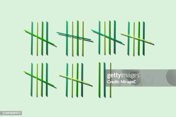 green colored plastic straws tally chart - counting stock pictures, royalty-free photos & images