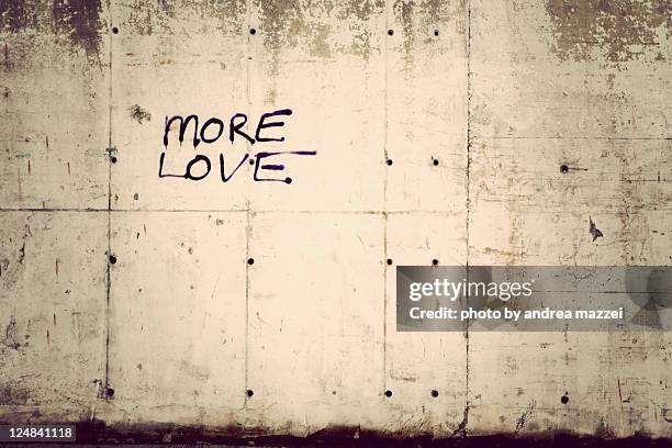 text written on wall - graffiti text stock pictures, royalty-free photos & images