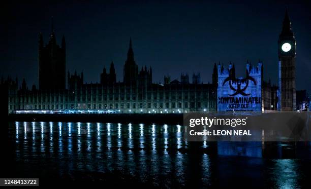 Biological warning is projected into the Houses of Parliament in London, 11 April 2007, to promote the release of the film, "28 Weeks Later". In this...