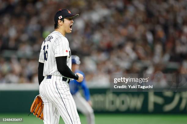 Shohei Ohtani of Team Japan reacts after throwing a strikeout in the fourth inning during the 2023 World Baseball Classic Quarterfinal game between...