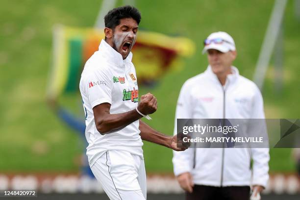 Sri Lanka's Kasun Rajitha celebrates New Zealand's Tom Latham being caught on day one of the second Test cricket match between New Zealand and Sri...
