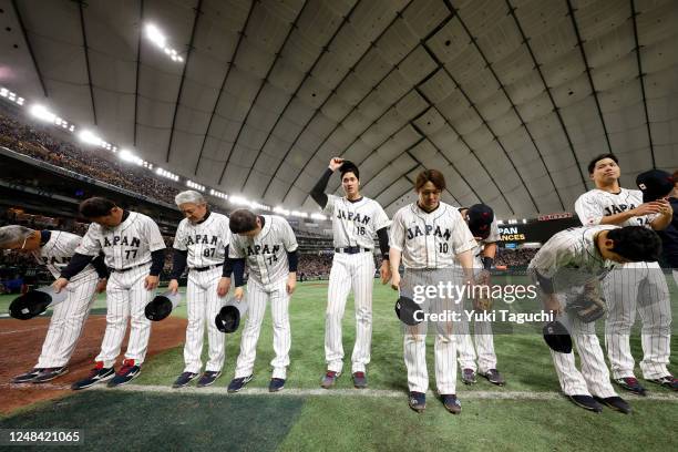 Members of Team Japan celebrate after their win over Team Italy in the 2023 World Baseball Classic Quarterfinal game at Tokyo Dome on Thursday, March...