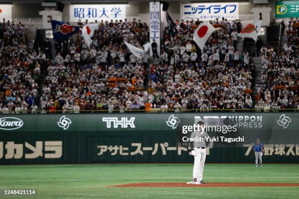 Shohei Ohtani of Team Japan looks on from second base in the third inning during the 2023 World Baseball Classic Quarterfinal game between Team Italy...